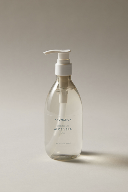 Bottle of Aromatica Organic Aloe Vera Gel against a soft grey background.