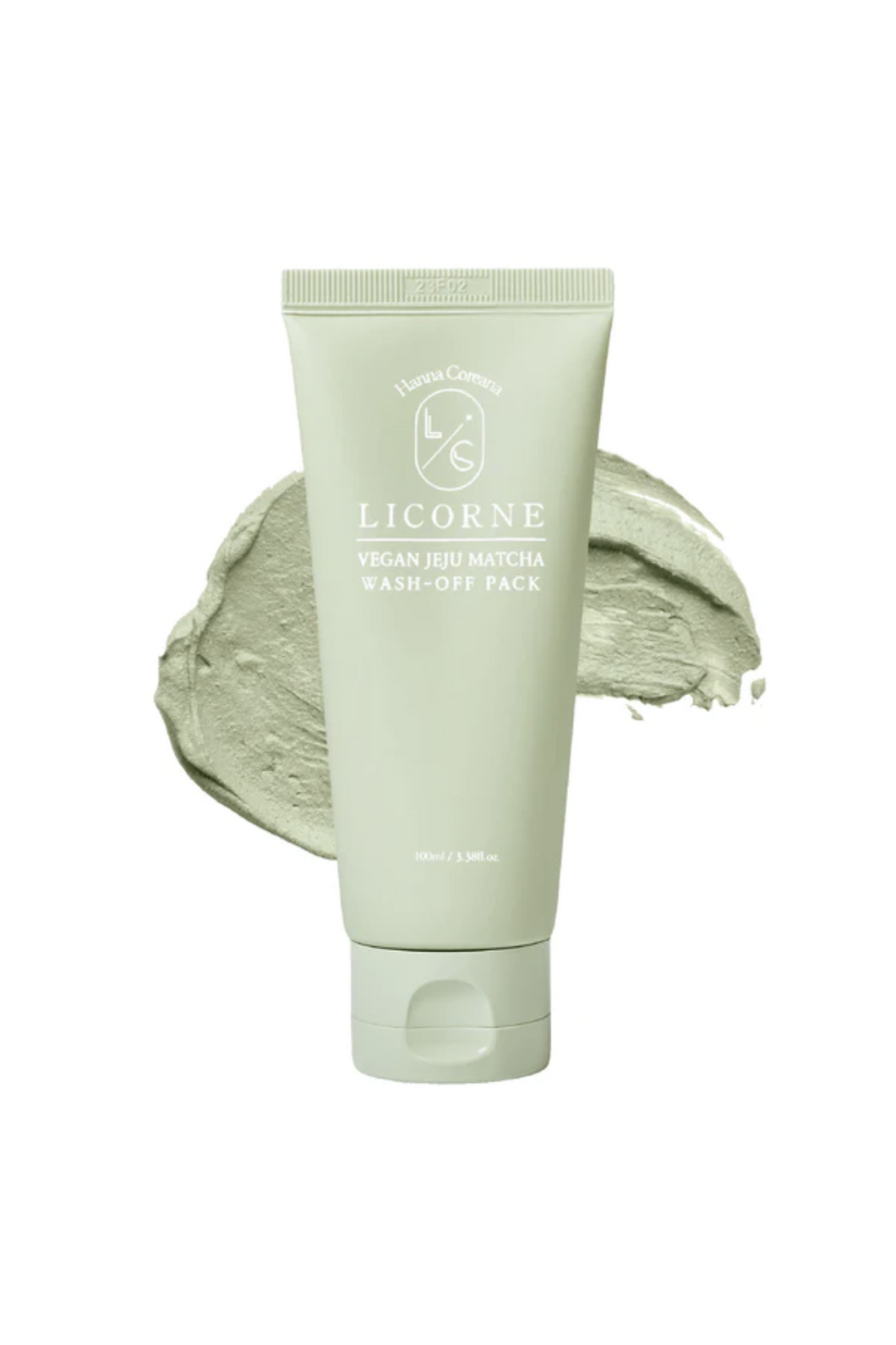 Tube of Licorne's Matcha Wash Off Pack in front of a white background and a smear of its texture. Available for purchase at Sinless Skincare.