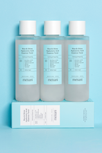 Load image into Gallery viewer, Three 150ml bottles of Meisani&#39;s Rice &amp; Shine Hyaluronic Acid Essence Toner standing in a row on top of one product box, against a light blue background. Available at Sinless Skincare.
