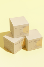 Load image into Gallery viewer, Three boxes of Ondo Beauty&#39;s Multiacids &amp; Papaya Cleansing Balm stacked crooked like a pyramid, against a light yellow background. Available for purchase at Sinless Skincare.
