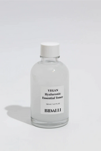 Bottle of Bidalli's Hyaluronic Essential Toner against a light grey background.