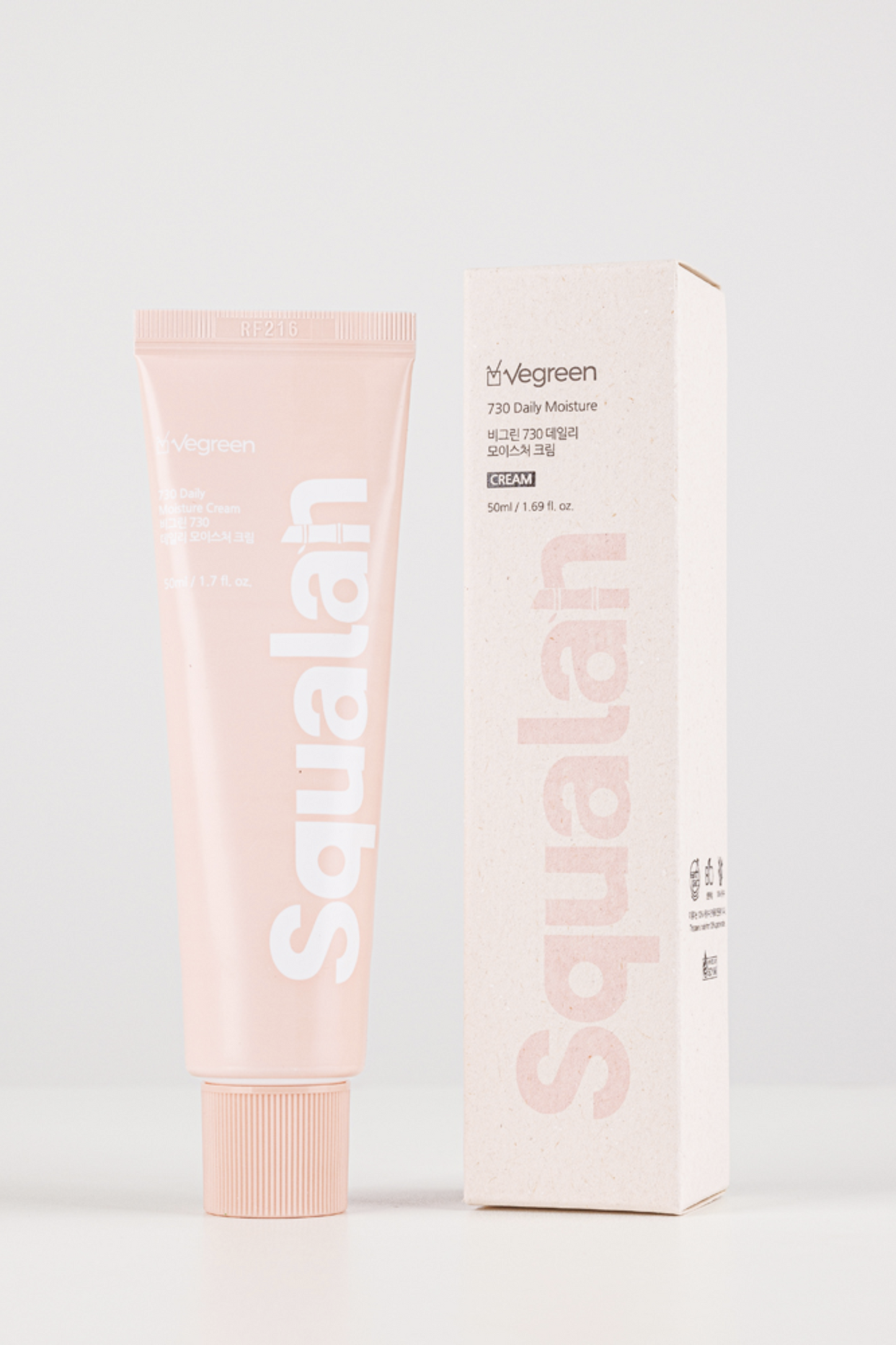 Close up of Vegreen's 730 Daily Moisture Cream tube and box against a light grey background.