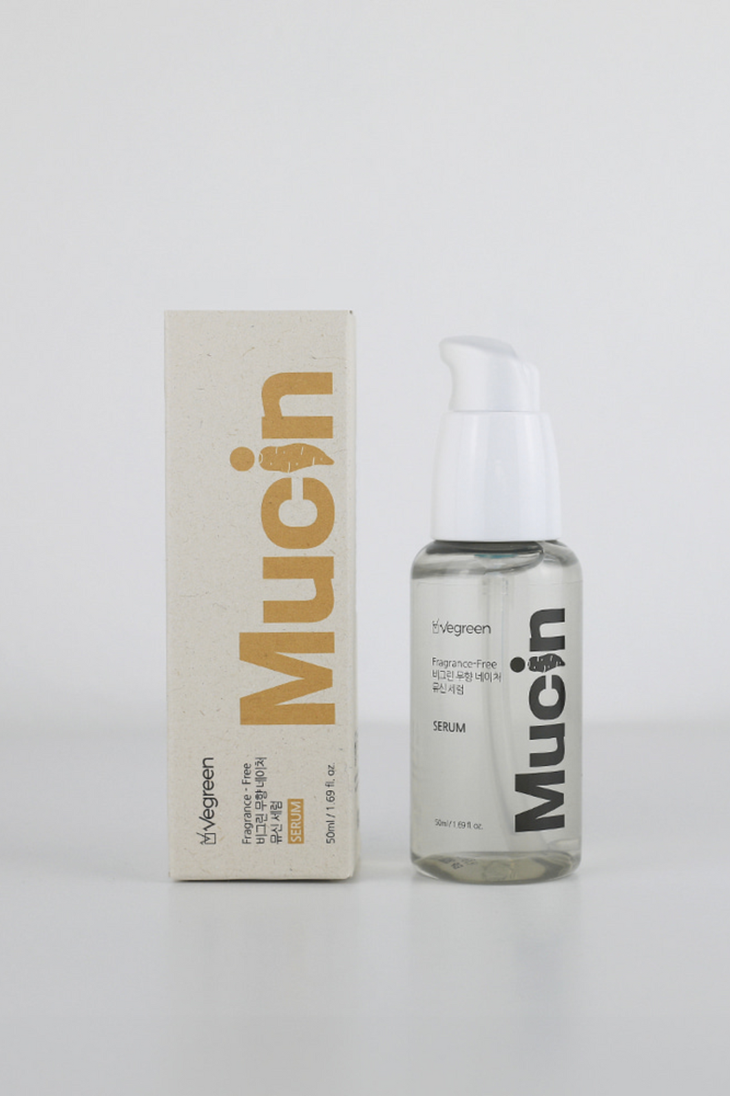 Vegreen's Nature Mucin Serum bottle and box standing against a light grey background.