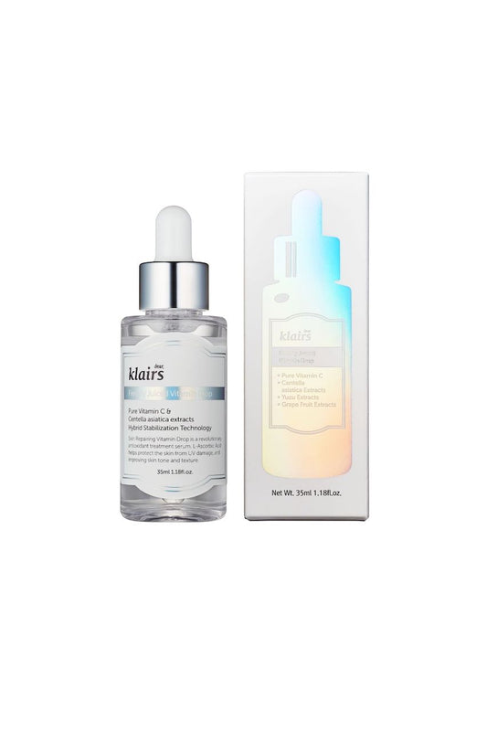 Bottle of Klairs' Freshly Juiced Vitamin Drop standing next to its box against a white background. Available for purchase at Sinless Skincare.